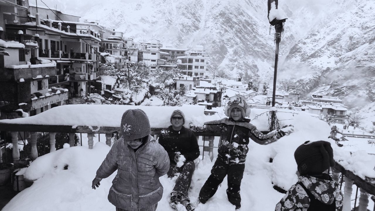 Untitled designwinter vacation with family in the snowy mountains (54) Children playing in the snow during vacation