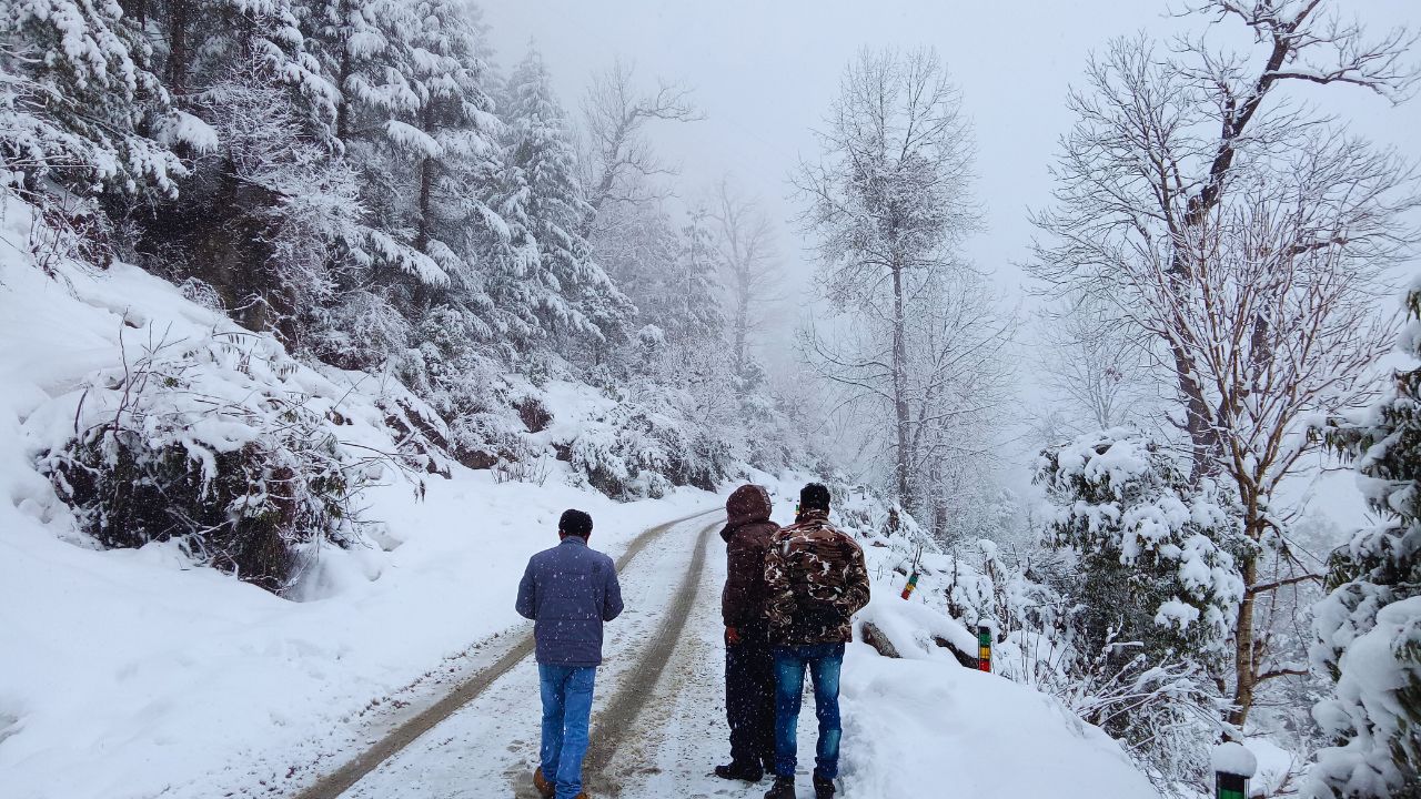 The snowy white landscapes of the mountains after snowfall Family bonding in the snowy mountains